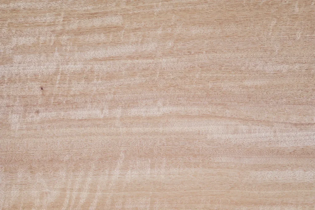 Figured anigre veneer quarter cut with a wavy and contrasted grain pattern
