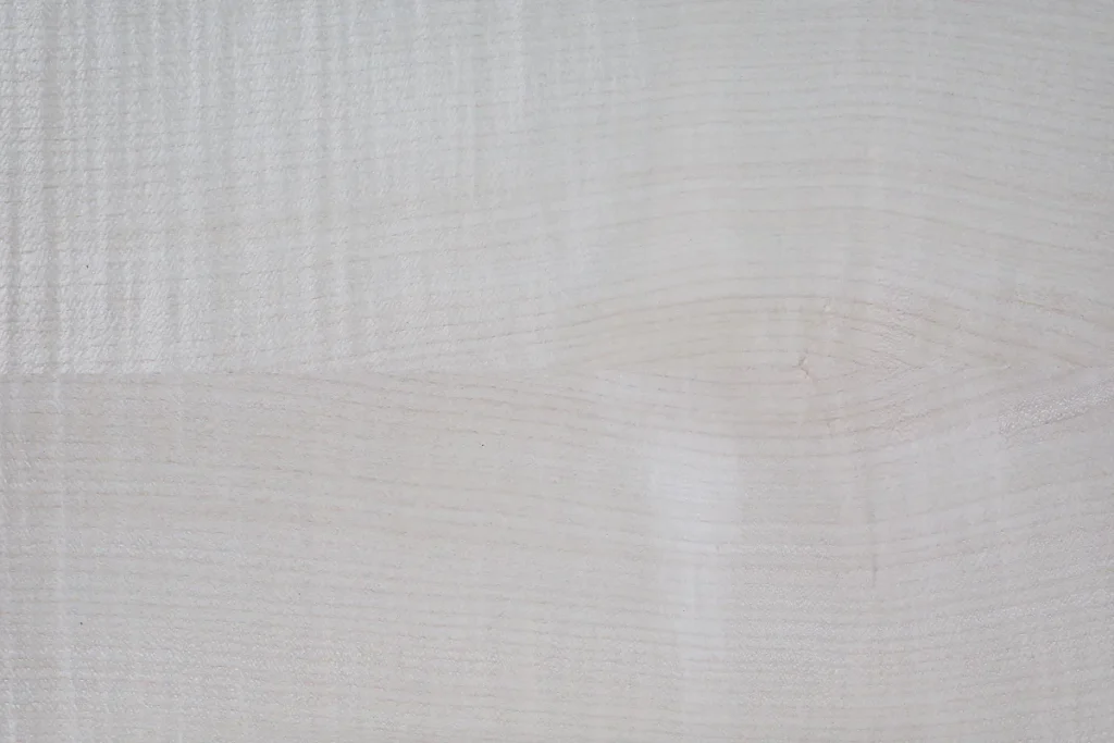 Figured maple veneer quarter cut with fine and structured figure