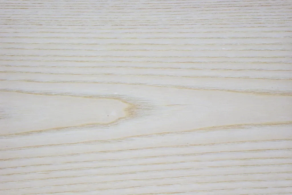 White ash wood veneer flat cut with open grain and natural light tones
