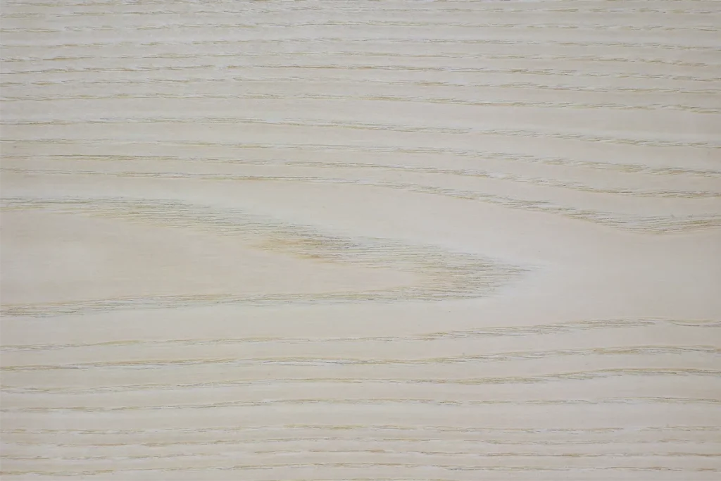 White ash wood veneer flat cut with cathedral pattern and subtle grain contrast