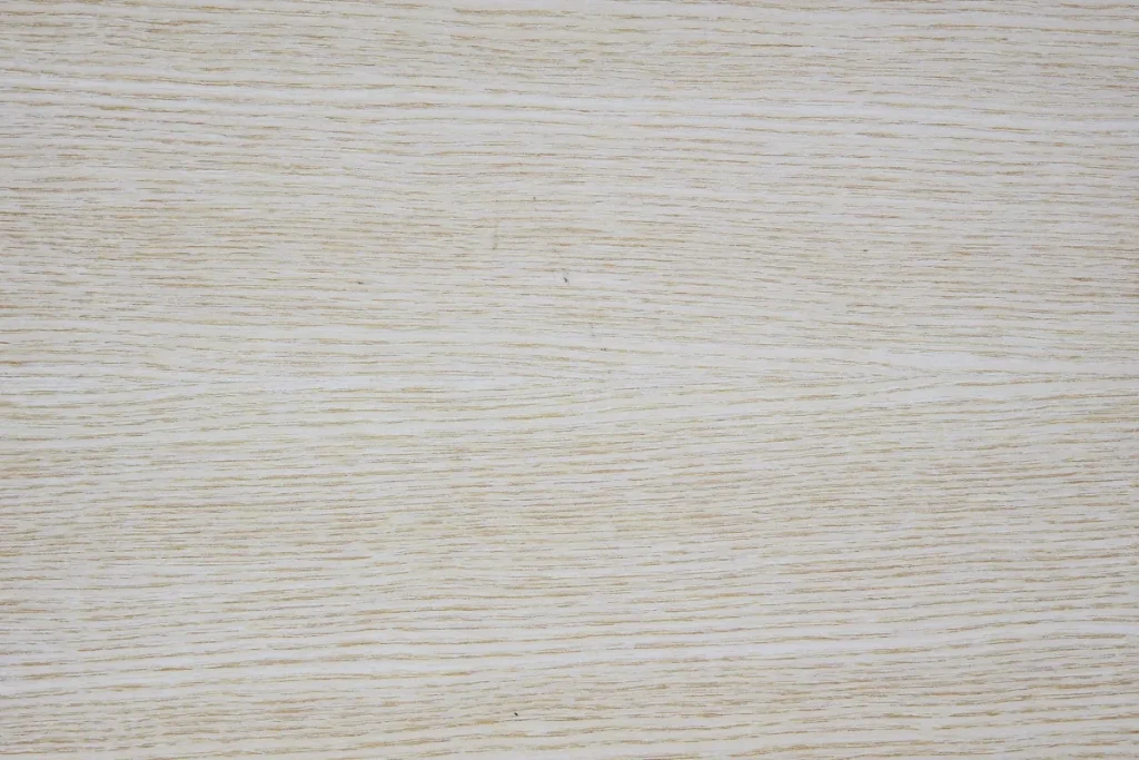 White ash wood veneer quarter cut with linear structure and consistent light appearance