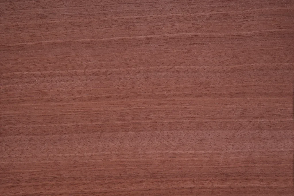 Makore veneer quarter cut with warm brown tones and subtle linear grain