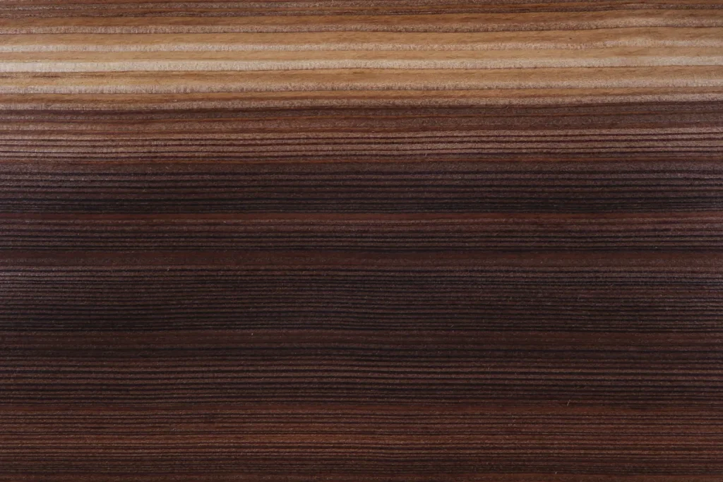 Fumed larch veneer quarter cut with strong contrast and enhanced linear grain