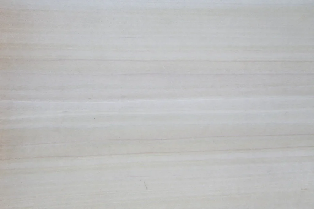 White poplar veneer quarter cut with consistent texture and very light tonal variation
