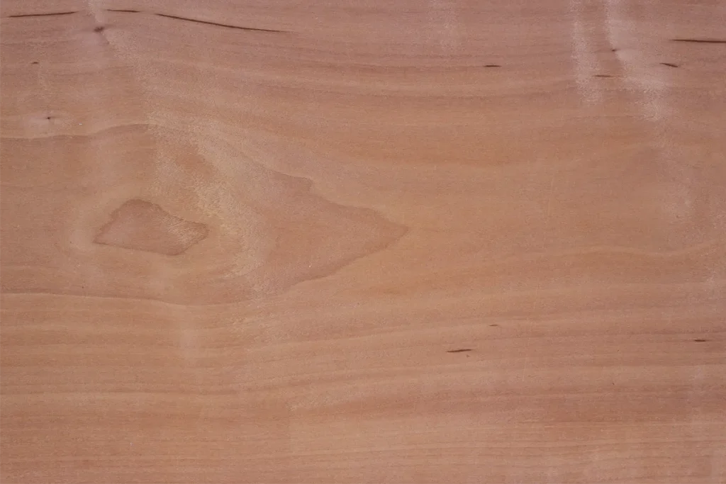 Flat cut pearwood veneer with subtle flowing grain and slight natural variation
