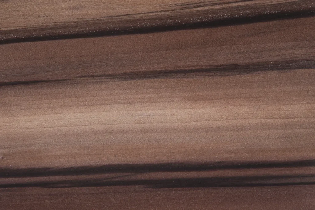 Fumed red gum veneer with flowing grain and deep contrasts enhanced by the fuming process