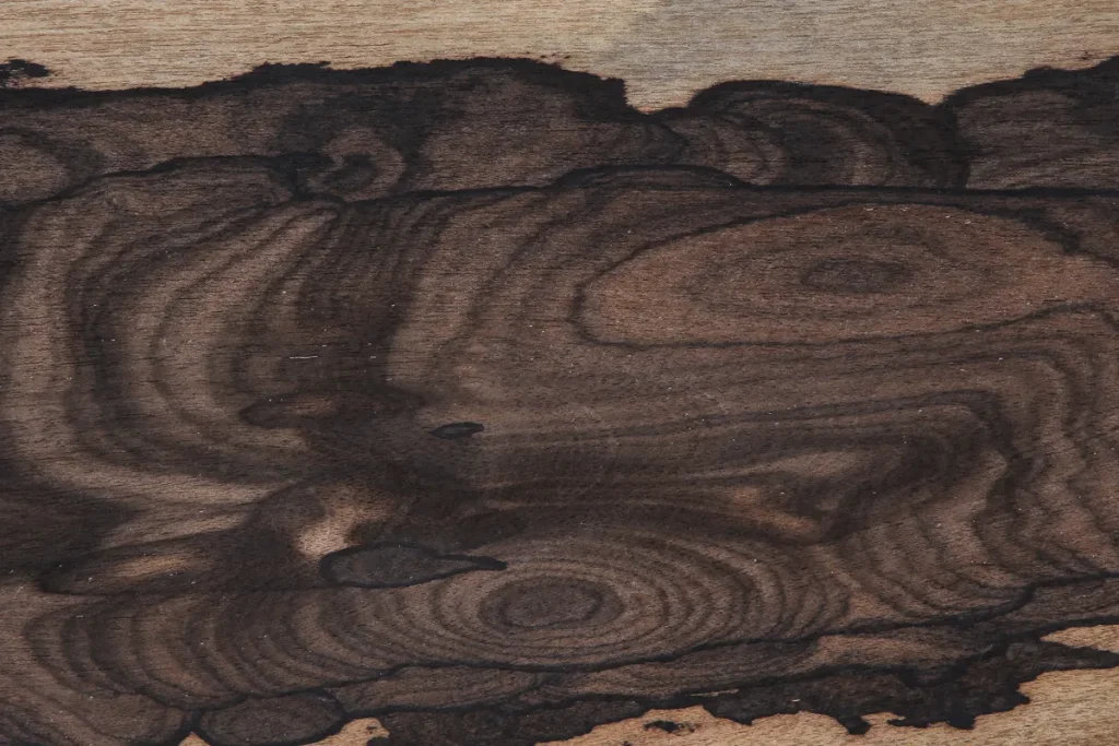 Flat cut Ziricote wood veneer with expressive grain and organic dark patterns