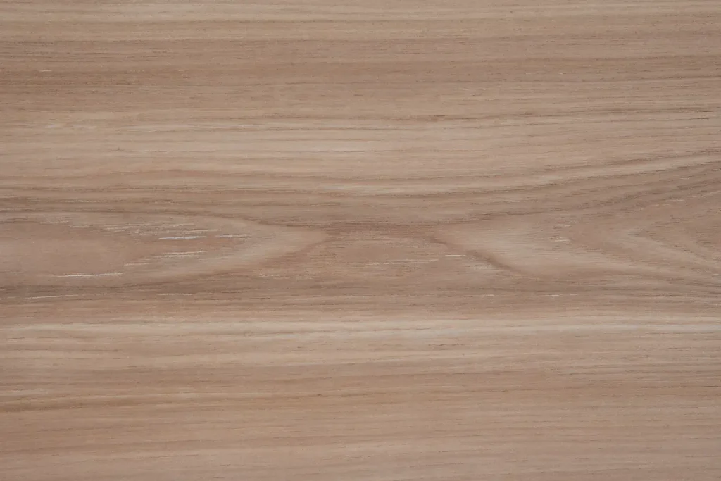 Grey elm wood veneer flat cut, featuring cathedral grain pattern with natural grey-beige tones